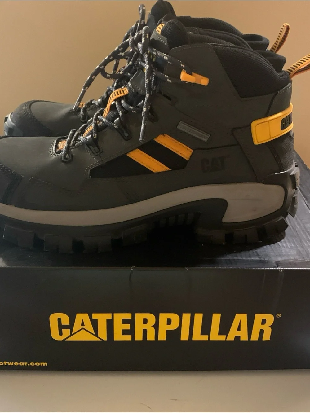 Caterpillar Black and Yellow Men’s Rugged Work Boots